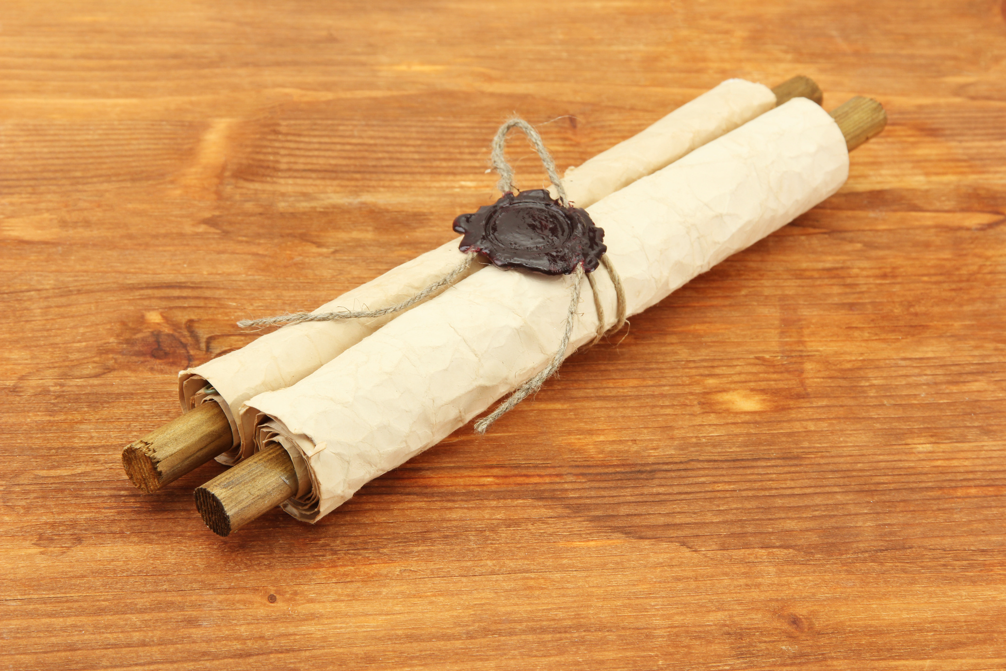 Old Scroll, on Wooden Background